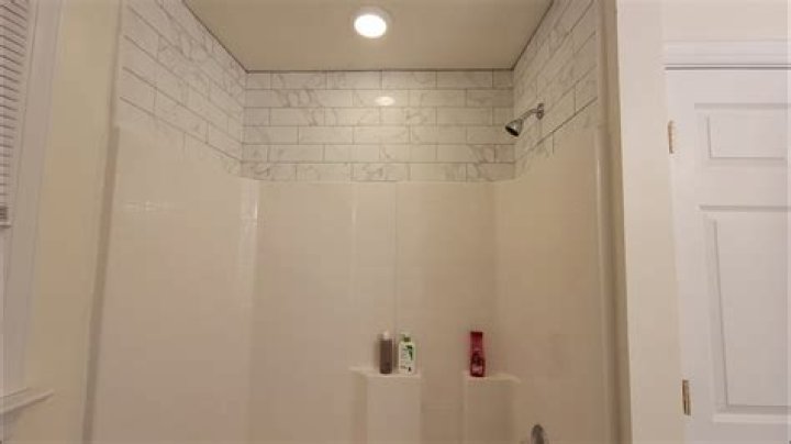 Can you tile a shower surround?