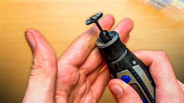 How do you loosen a Dremel Chuck?