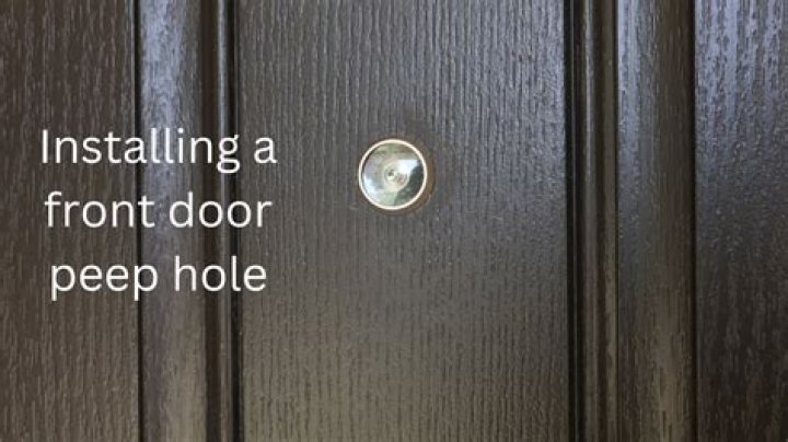 How high do you put a peephole in a door?